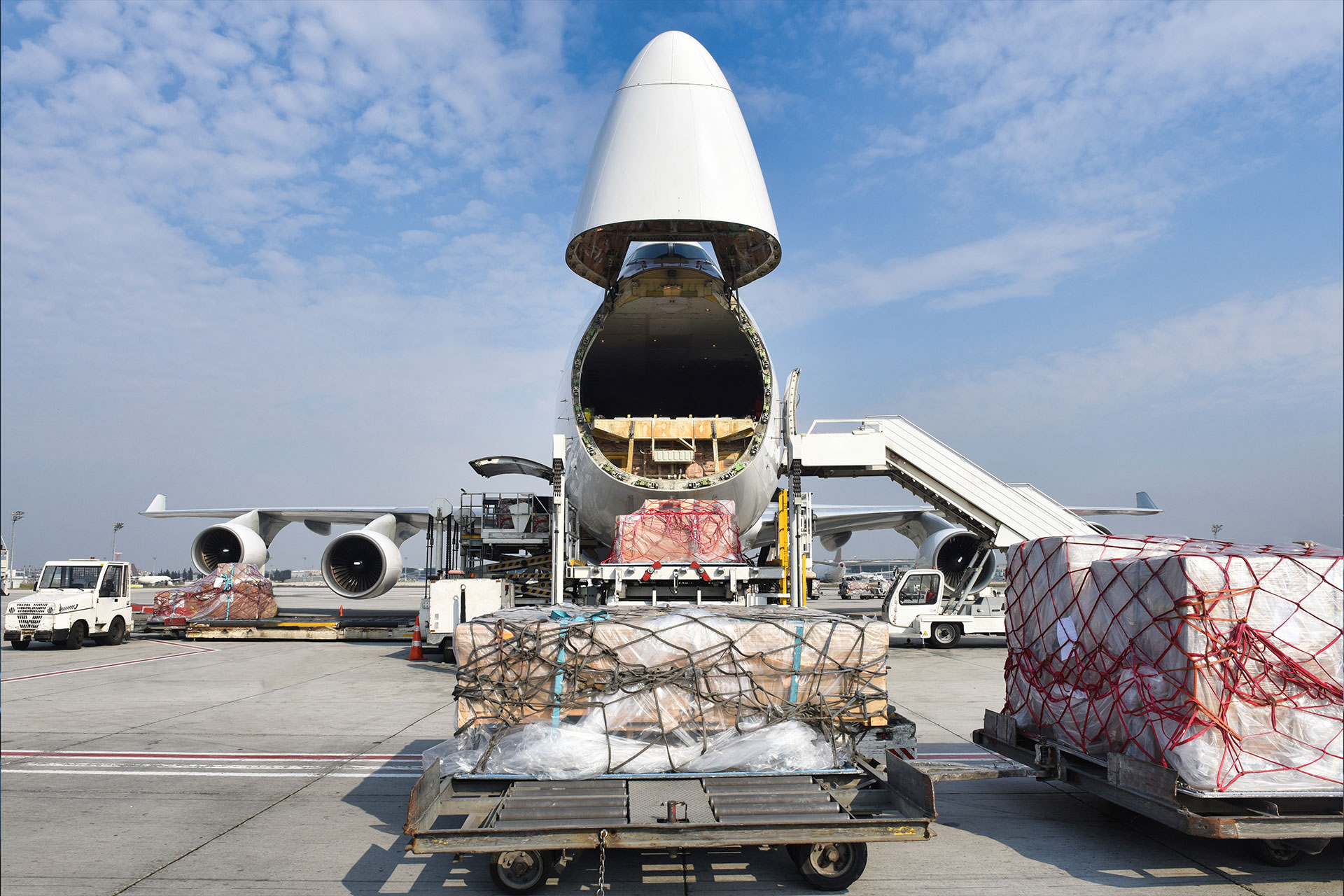 Cargo plane being loaded with international freight at the airport